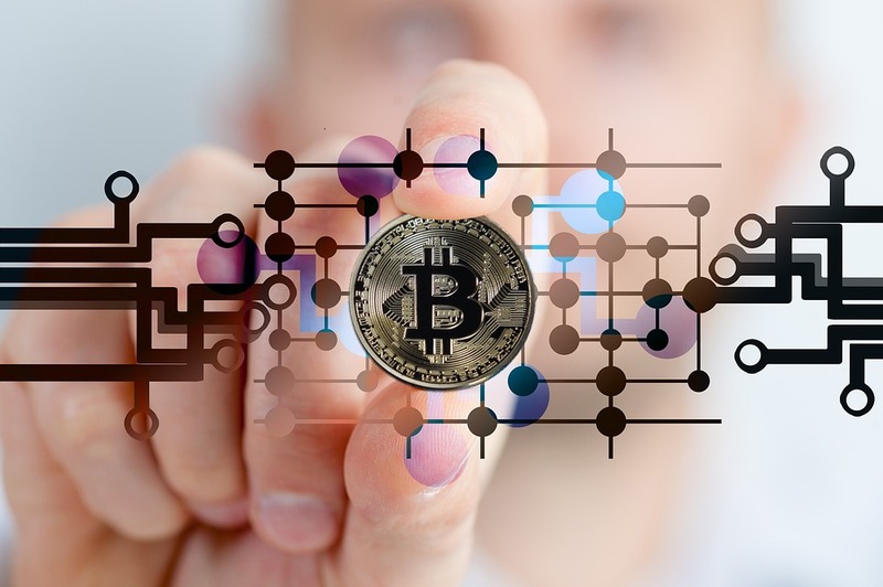Crypto - Bitcoin Blockchain Background with Hand